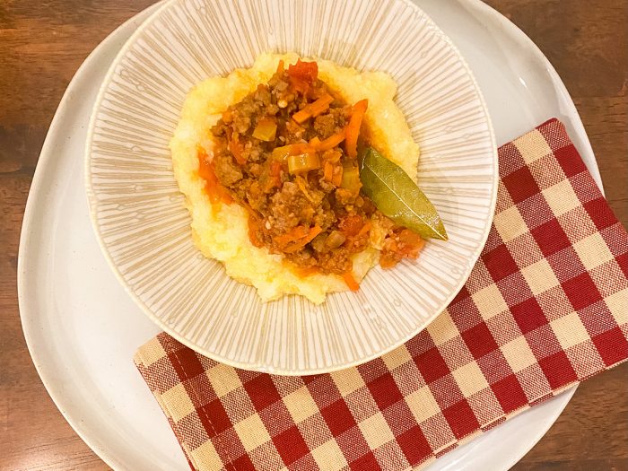 Sausage Ragù Over Creamy Polenta